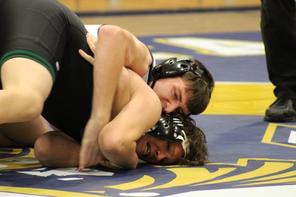 On Jan. 11, at the Bonita Vista High gym, sophomore Jad Keddo (192) cracks down on his Hilltop High opponent in attempts to maintain control. This was a essential game leading up to the wrestling dual meet held on Jan. 25.