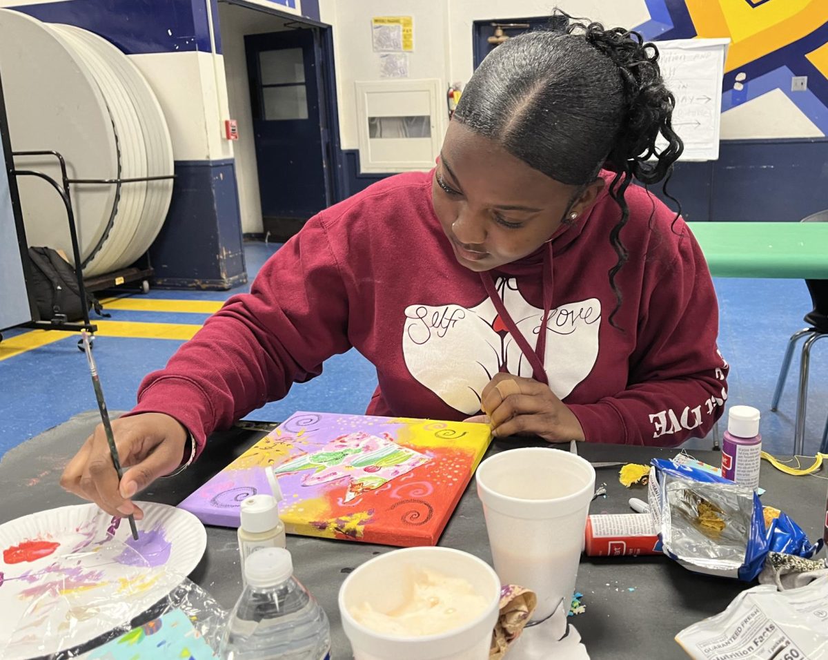 On Feb. 15, Eastlake High School senior Dior Cook creates a painting based off black artists at the Paint and Sip event host at BVH. The event was coordinated by Sweetwater Union High School District (SUHSD) Black Student Unions and is open to SUSHD families.