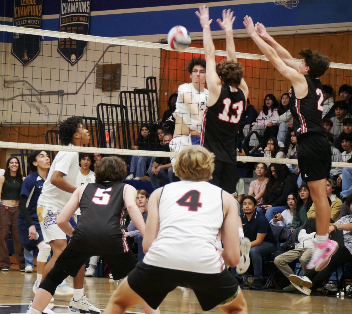 On Feb. 23, the Bonita Vista High (BVH) Barons boys varsity volleyball team faced the Canyon Hills High (CHH) Rattlers in a tournament matchup. Midway through the first set, BVH spikes the ball in the hopes of scoring another point against CHH.