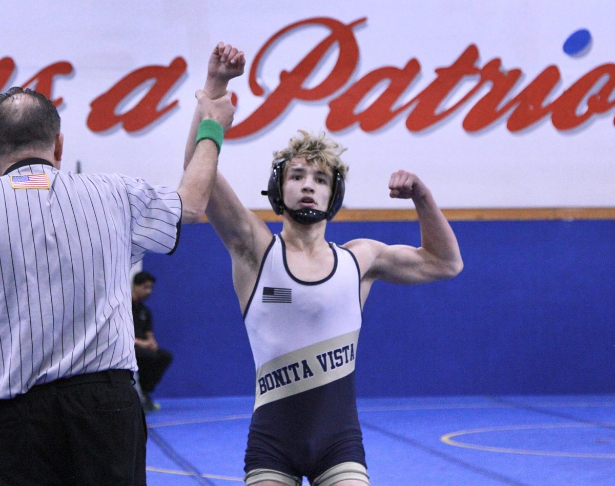 On+Feb+10%2C+Bonita+Vista+High+%28BVH%29+120-pound+wrestler%2C+team+captain+and+junior+Josue+Garcia+raises+his+fist+after+winning+a+match+for+the+San+Diego+Section+boys+CIF+Division+II+tournament+at+Orange+Glen+High.+Garcia+would+go+on+to+place+first+at+the+tournament%2C+paving+the+way+for+his+eventual+promotion+for+the+end-of-season+statewide+California+tournament.+