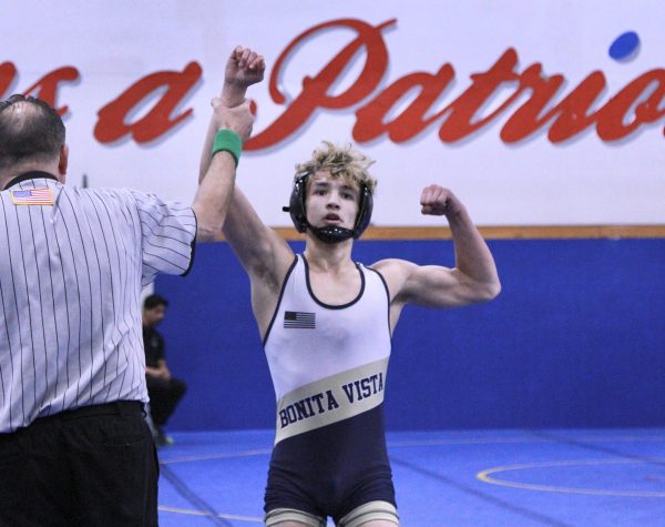 On Feb 10, Bonita Vista High (BVH) 120-pound wrestler, team captain and junior Josue Garcia raises his fist after winning a match for the San Diego Section boys CIF Division II tournament at Orange Glen High. Garcia would go on to place first at the tournament, paving the way for his eventual promotion for the end-of-season statewide California tournament. 