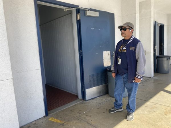 At Bonita Vista High (BVH), campus security Oscar Paniagua observes BVH students as they enter and leave the 700s Boys restrooms. Paniagua has spent numerous years working at BVH to assist the campus to being a safe place for the BVH community.