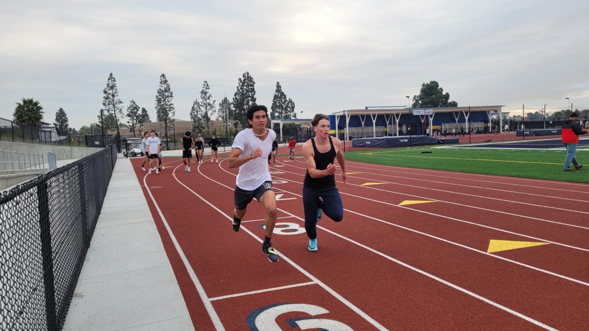 On+Feb.+26%2C+BVH+senior+and+track+athlete+practiced+with+senior+and+track+athlete+Tyler+Scott.+The+pair+are+doing+sprints+to+warm-up+for+their+practice.
