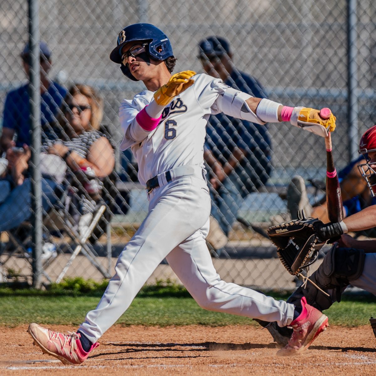 On April 10, the Bonita Vista High (BVH) Barons boys varsity baseball team battled the West Hills High (WHH) Wolfpack in a one sided victory.  BVH shortstop, second baseman and senior Luis Sosa (6) hits the ball into deep left field for his second double of the game. 