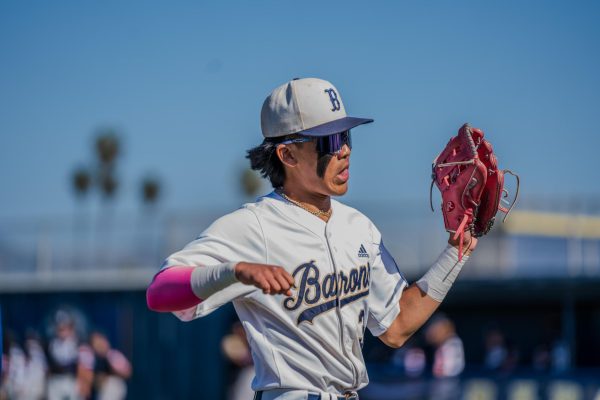 BVH outfielder and senior Harry Shin (3) is excited as his team gets out of a second inning jam. Shins fielding ability would help the Barons shutout the Wolfpack.