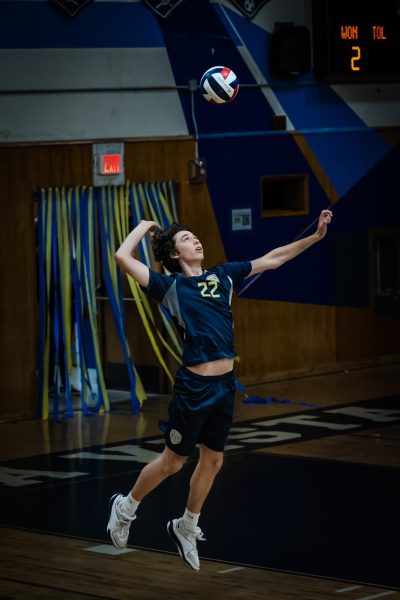 On April 25, the Bonita Vista High (BVH) varsity boys volleyball team took down the Mar Vista High (MVH) Mariners. Deep into the fourth set, BVH opposite hitter, outside hitter and senior Daniel Robitaille (22) serves the ball to kick off the rally. 