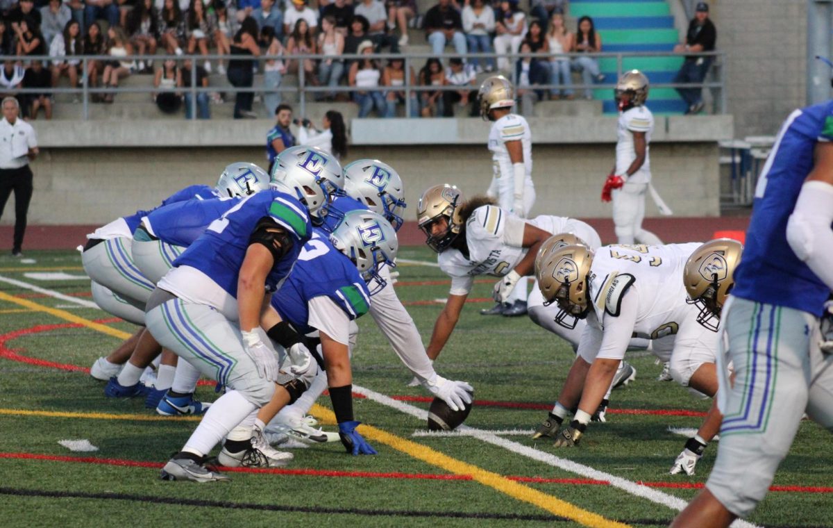 BVH boys football team lines up against Eastlake High School (EHS) during the first quarter.  EHS has possession of the ball as BVH serves defense.