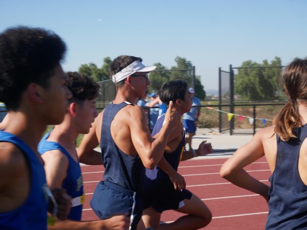 On Oct. 10, BVH hosts a dual meet versus Eastlake High School (EHS). Senior Elijah Villalobos (left) and freshman Leonardo Nguyen (right) run together as the race begins.