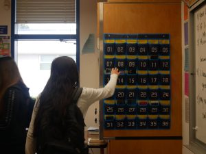 In order to prevent phones in his classroom, BVH chemistry teacher Ahmad Rice has designated slots for phones.