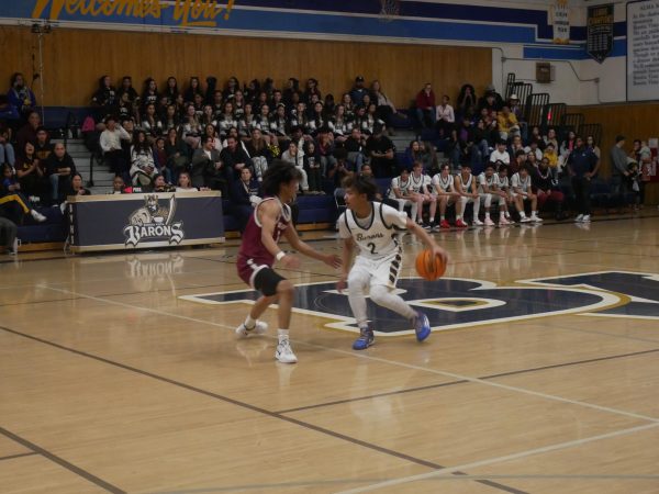 BVH Senior Isaiah Diaz working his way around Sweetwater Senior Khalid Deiranieh. Combined efforts such as these would lead BVH to victory on January 17.