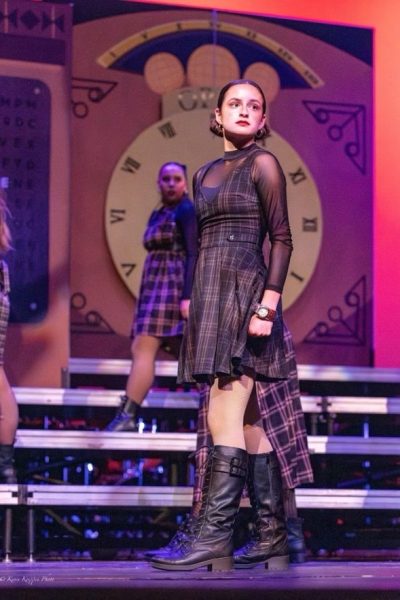 On Feb. 14 Music Machine holds their debut performance at Eastlake High School. Mackenzie Koeppen strikes a pose leaving her family and friends in awe. Photo provided by Mackenzie Koeppen.