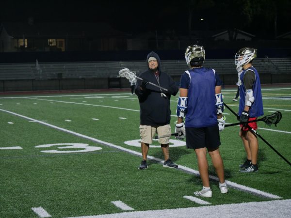 On Feb. 28, Coach Albright led a lacrosse practice at the BVH field. He demonstrates the correct form for passing, catching and cradling a ball.