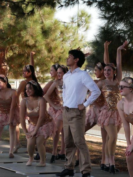 Get to The Pointe (GTP) dancer and junior Luka Ayon tap dances at BVH's breaking ground ceremony held on Dec. 20. GTP's close community allows them to highlight the dancers' performances at special events.