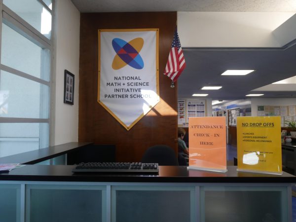 The desk area where late students use the new tardy system to insert their student ID before entering campus.