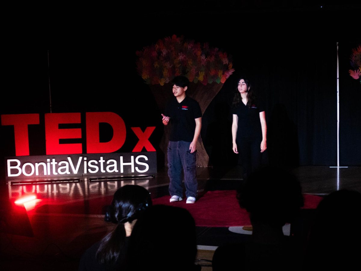 Opening the conference, senior president Louis Nguyen and junior vice president Elizabeth Hoffman introduce the club and this year's theme, "unity through humanity"