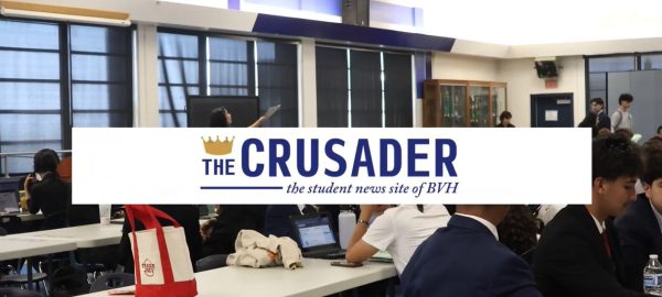 Mrs. Sias speaks to debate students from multiple schools during their 20 minute prep time before the first round of their evening.